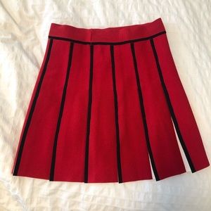 Red pleated skirt